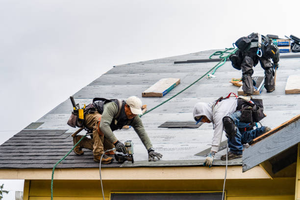 Professional Gutter Installation technician working in Ironia, NJ